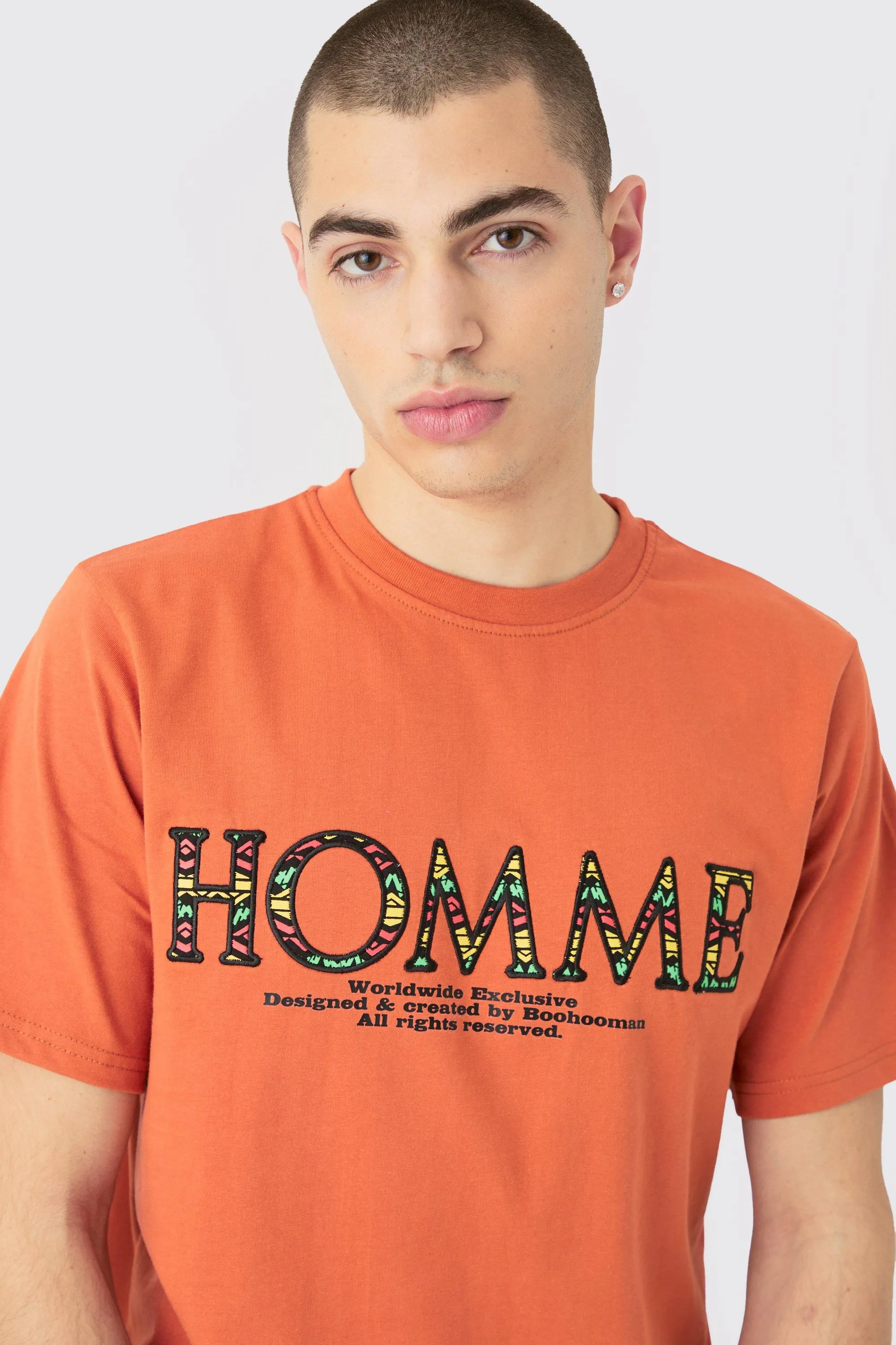 Homme Orange Embroidered Graphic Mens T-Shirt